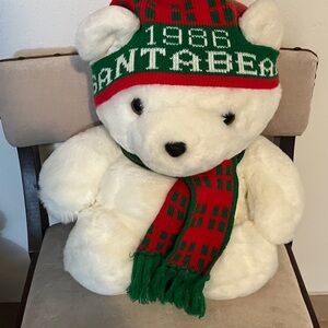 White Stuffed Bear with Red and Green Hat and Scarf